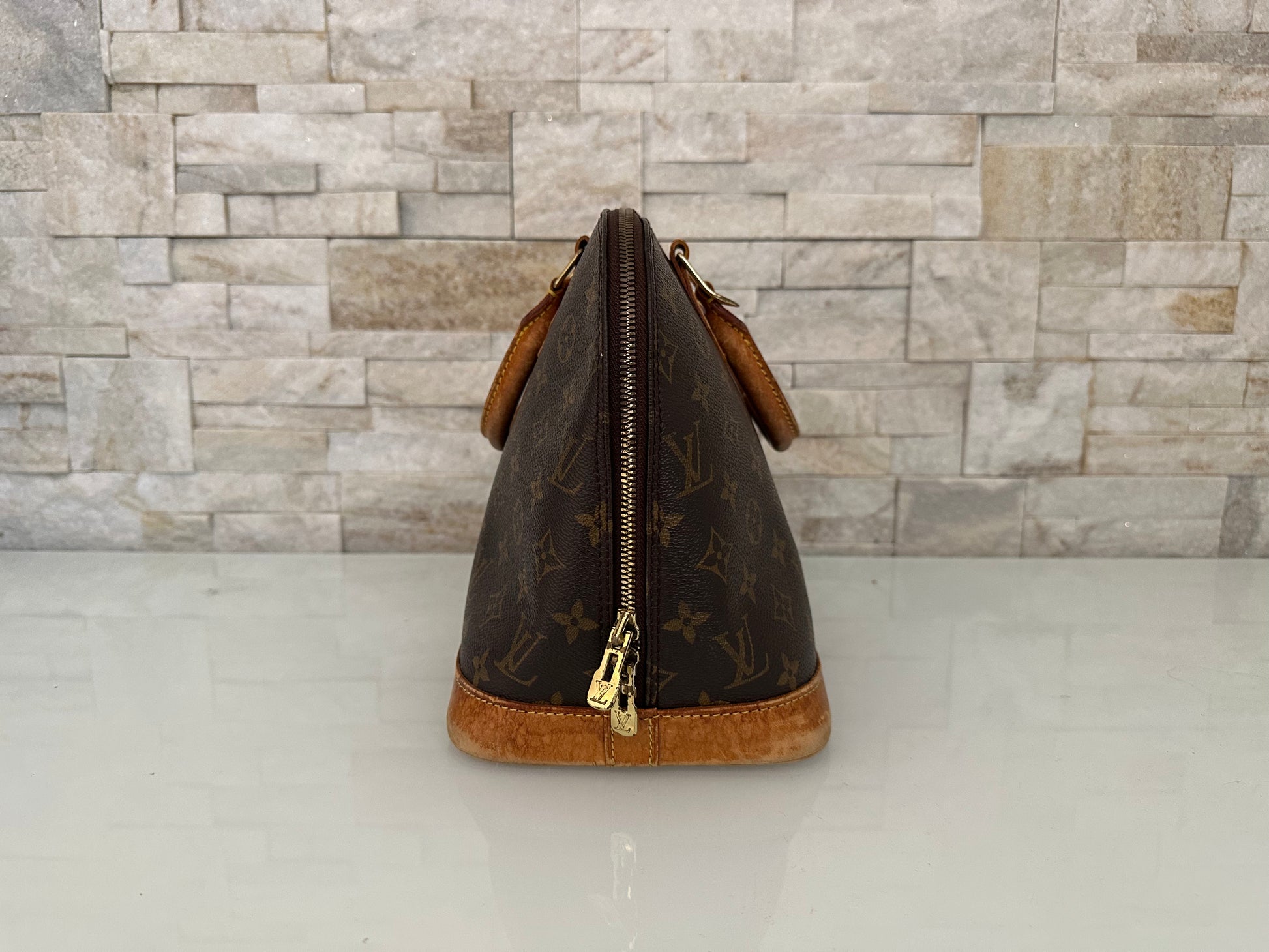 Louis Vuitton Alma Canvs Handtasche