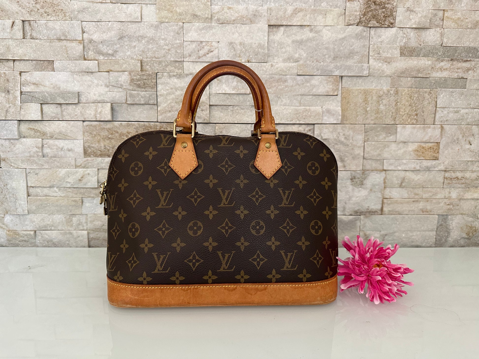 Louis Vuitton Alma Canvs Handtasche