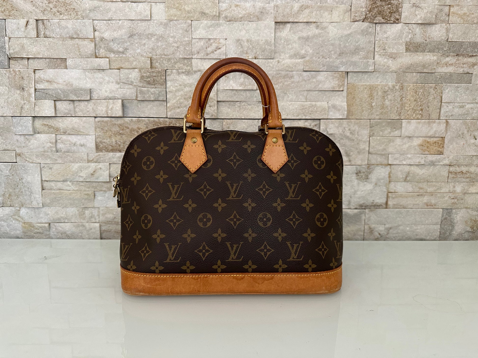 Louis Vuitton Alma Canvs Handtasche