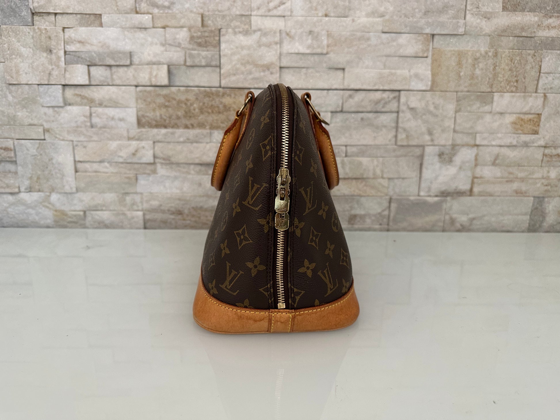Louis Vuitton Alma Canvs Handtasche
