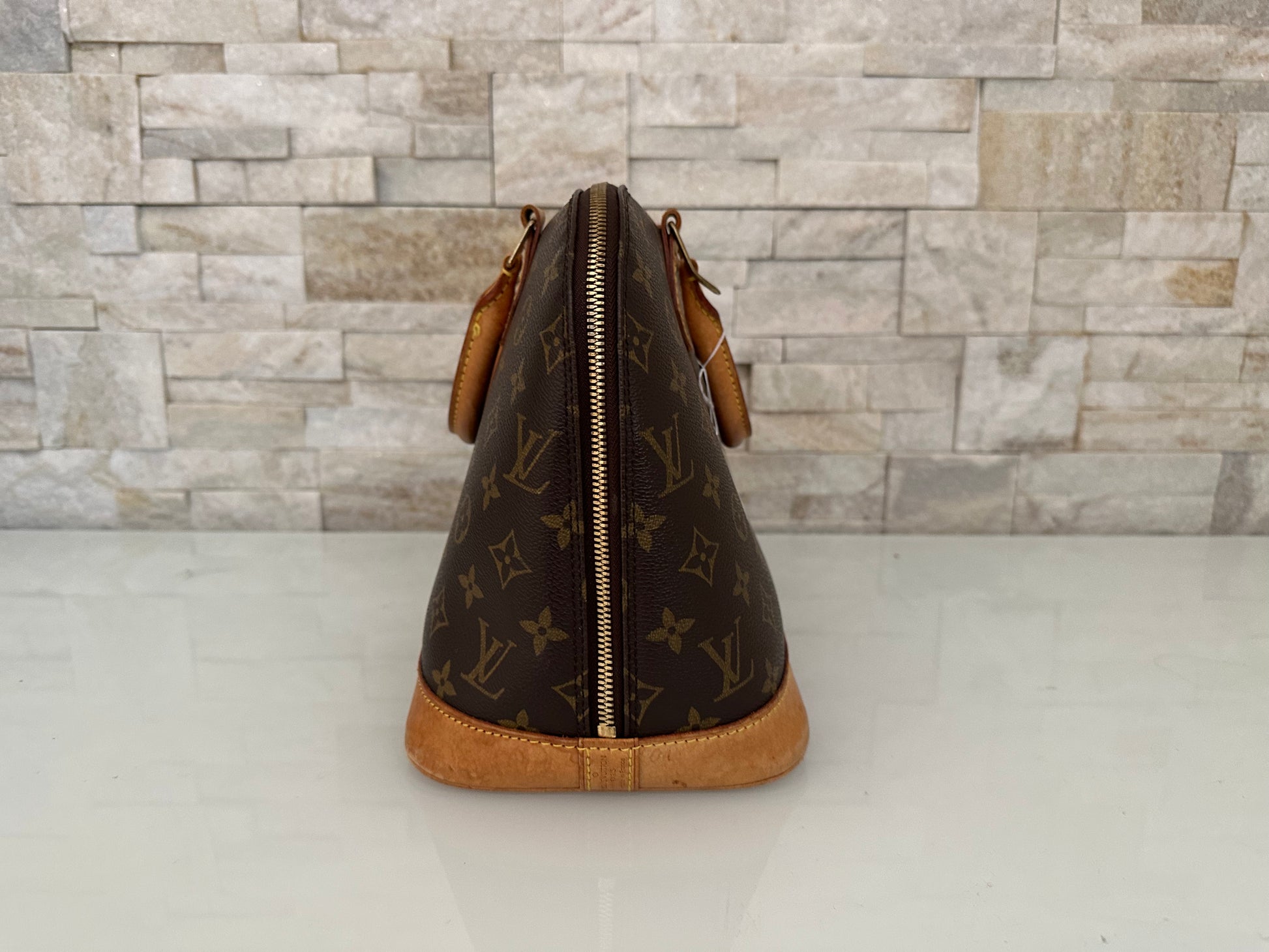 Louis Vuitton Alma Canvs Handtasche