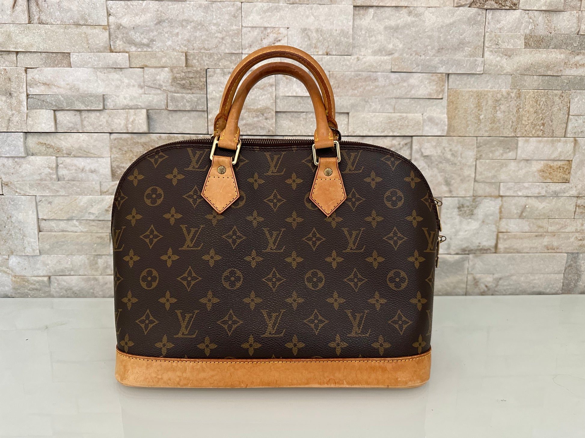 Louis Vuitton Alma Canvs Handtasche