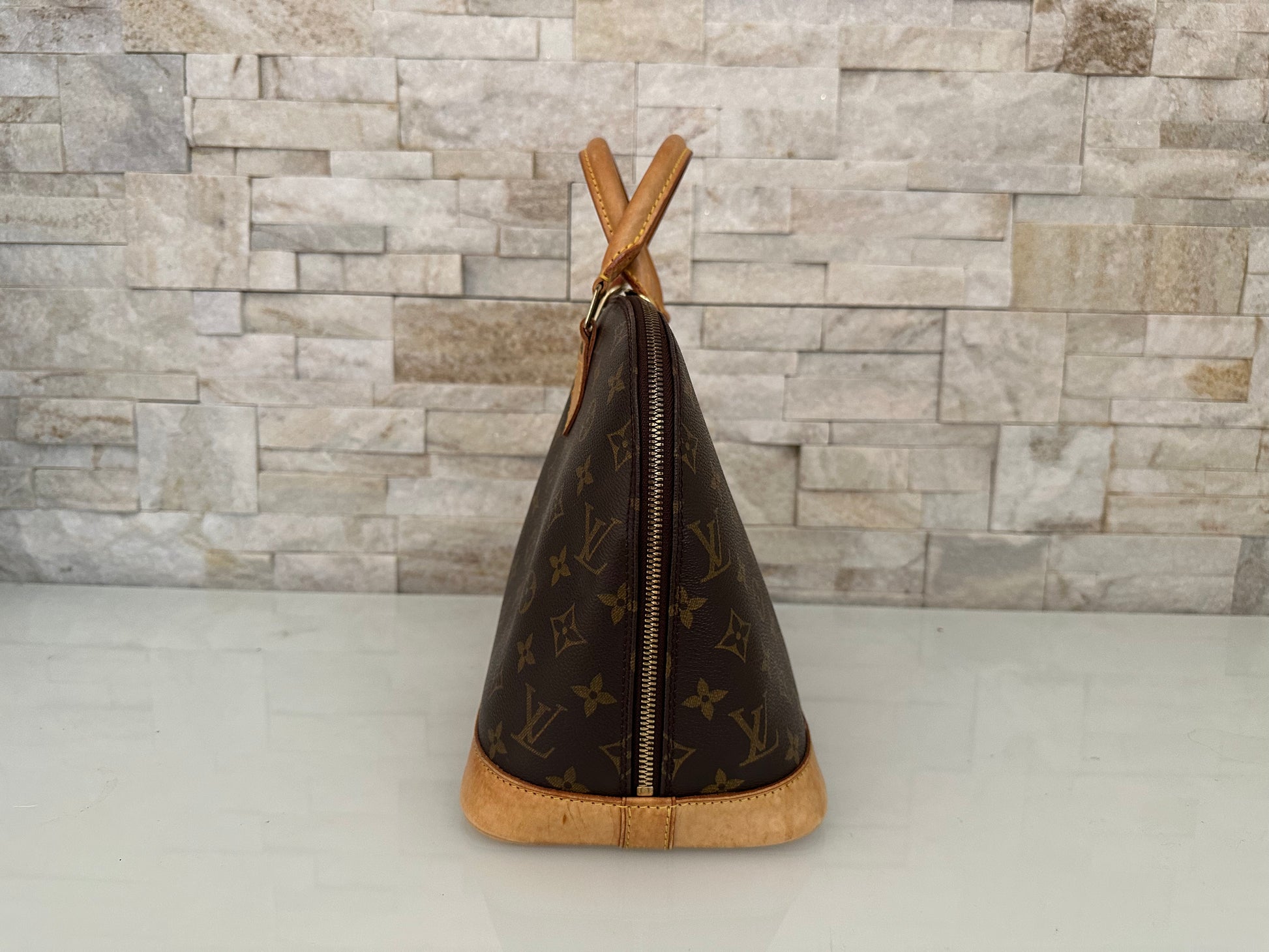 Louis Vuitton Alma Canvs Handtasche