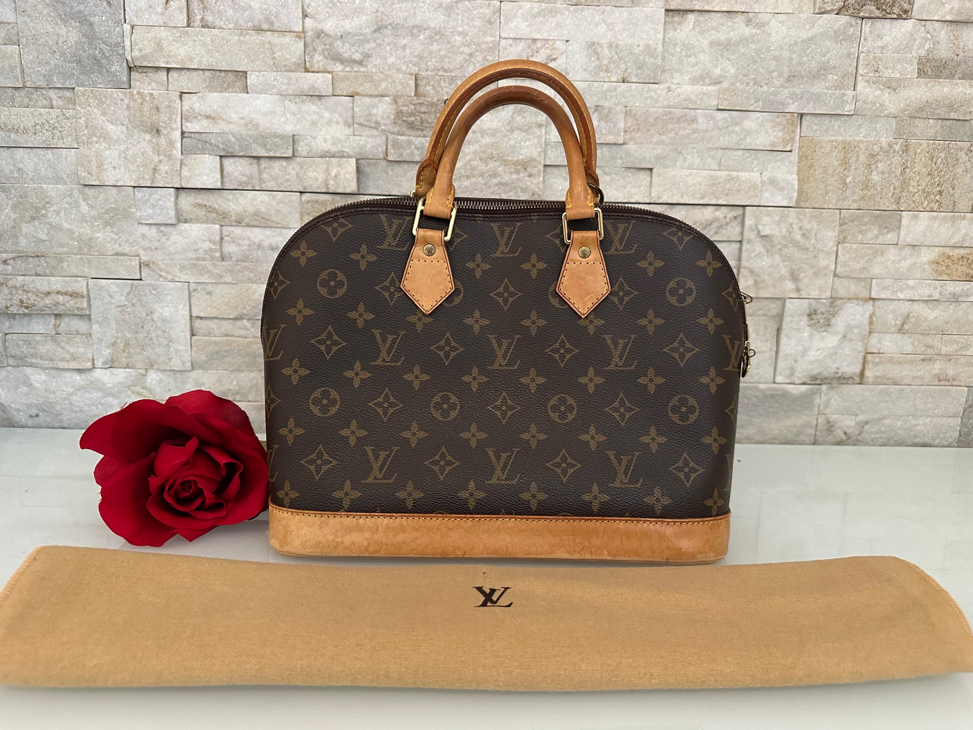 Louis Vuitton Alma Canvs Handtasche