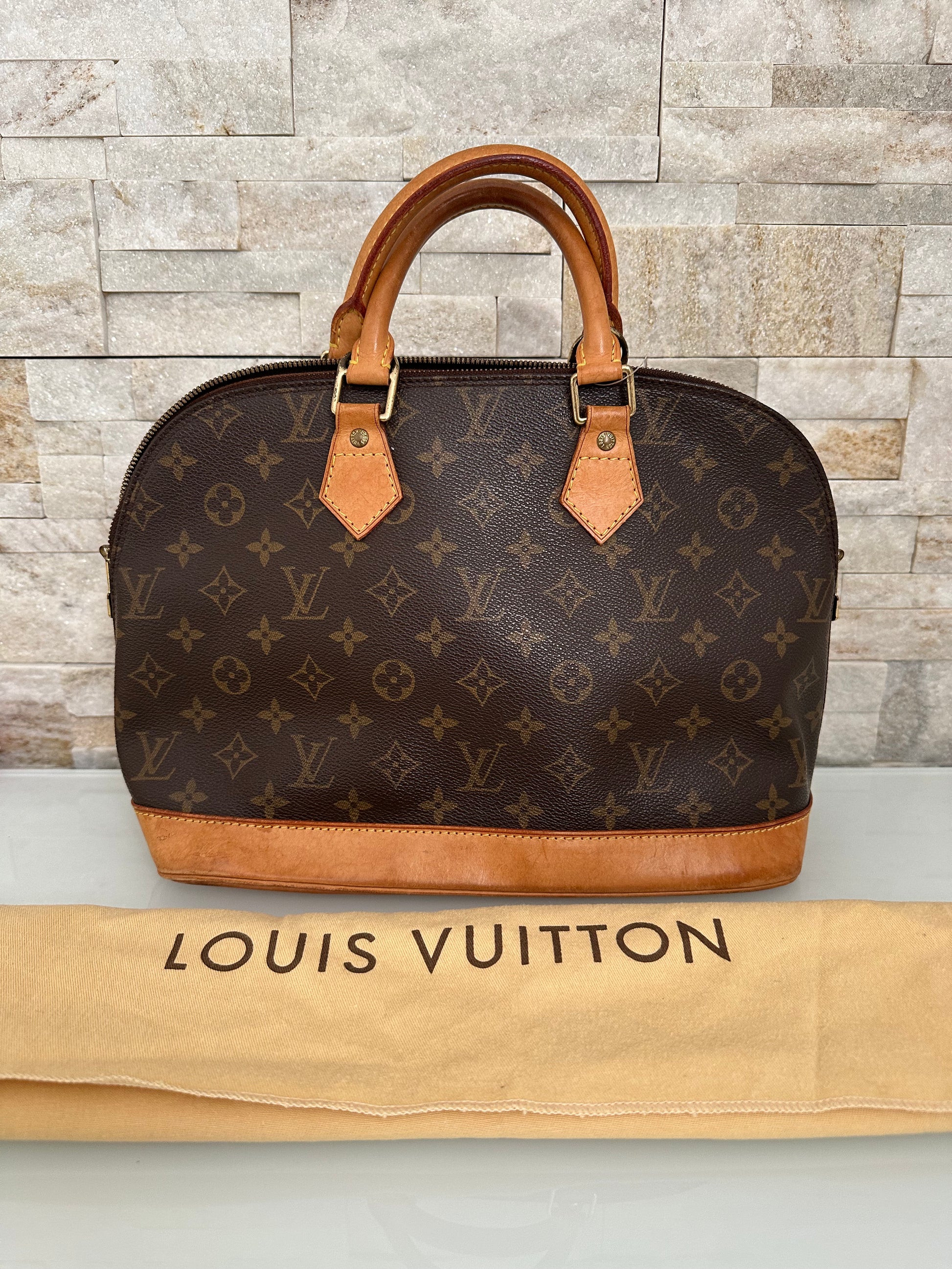 Louis Vuitton Alma Canvs Handtasche