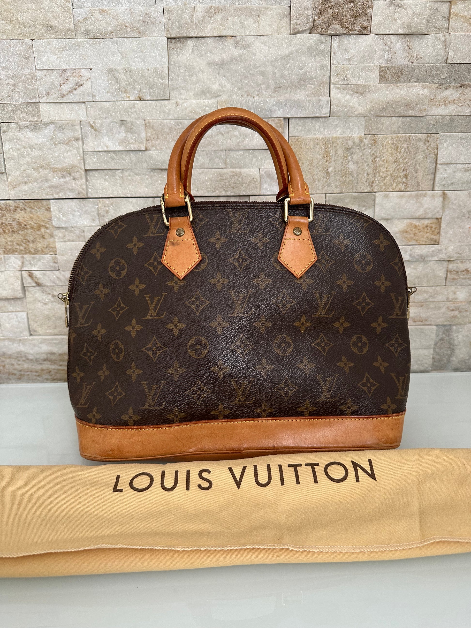 Louis Vuitton Alma Canvs Handtasche