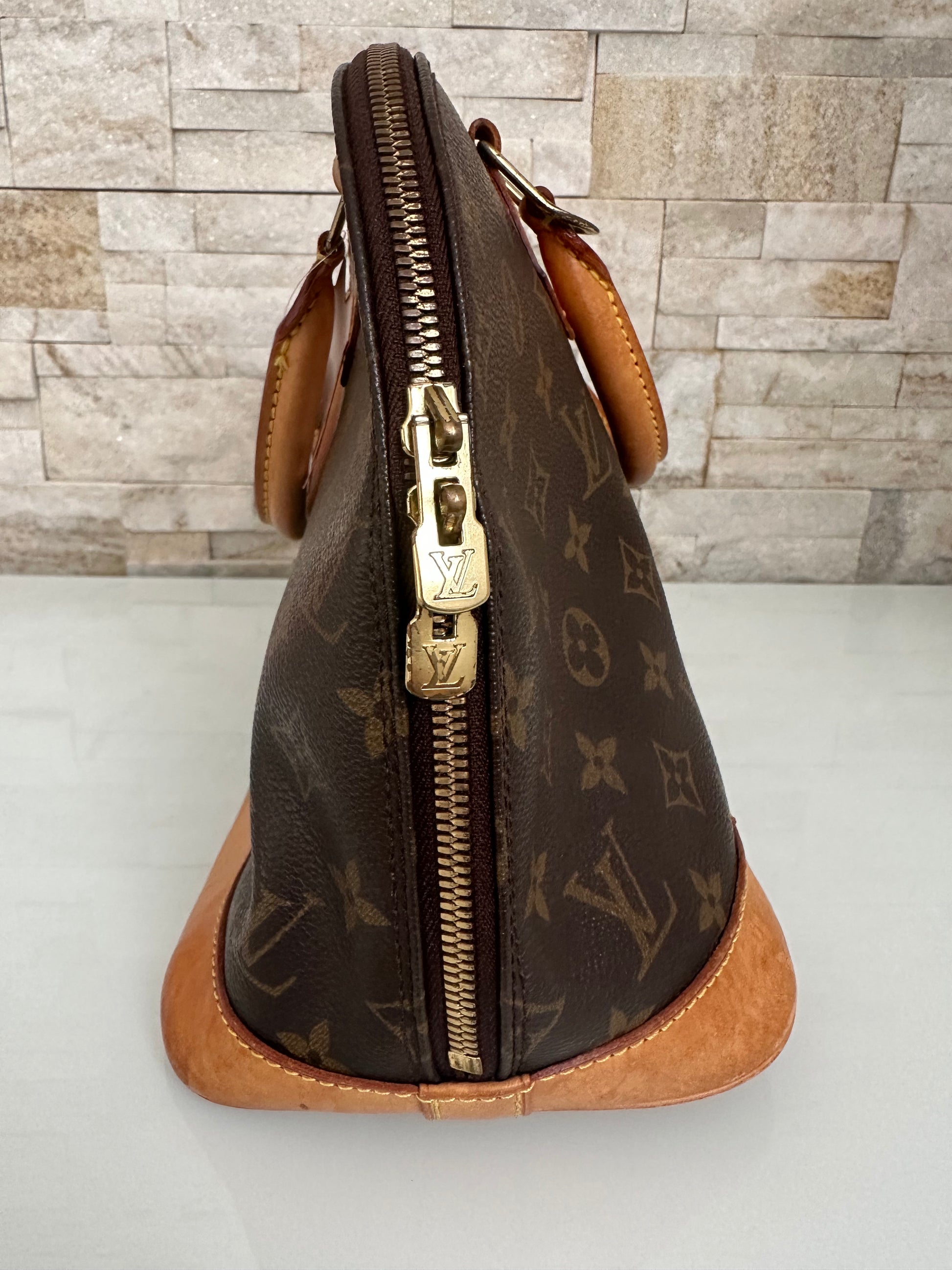 Louis Vuitton Alma Canvs Handtasche
